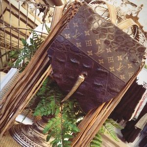One of a kind Fringe LV/Cow Hide backpack